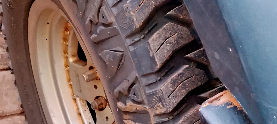 inspecting-the-tires-carefully-during-car-inspection